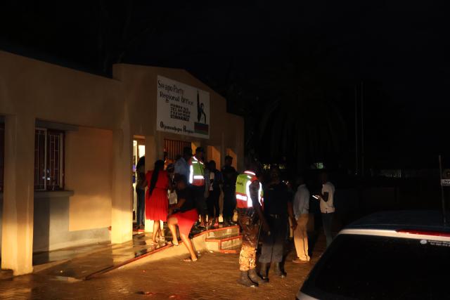 OTJIWARONGO, 06 February 2025 - A section of some Swapo Party members together with heavily armed police officers at a district conference of Otjiwarongo on Thursday night where two opposing groups of Swapo members clashed over claims of irregularities and misunderstandings before holding their conference. (Photo by: Mulisa Simiyasa) NAMPA