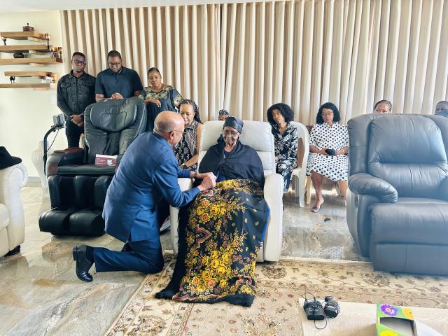 WINDHOEK, 09 February 2025 - President Nangolo Mbumba pictured with Former First Lady, Kovambo Nujoma at the Nujoma residence. (Photo by: Eba Kandovazu) NAMPA