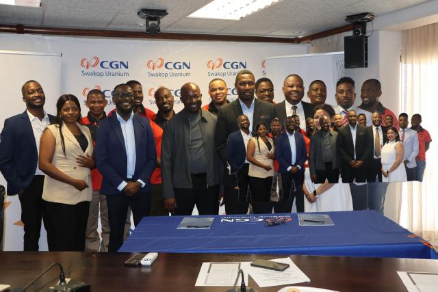 SWAKOPMUND, 27 February 2025 - NAMITVEST Principal Officer, Jason Kasuto and Swakop Uranium Vice President for Human Resources and Office of Company, Patrick Chizabulyo photographed with MUN management and worker representatives after the signing of the payroll deduction agreement between NAMITVEST and Swakop Uranium. The initiative will enable employees, particularly members of the Mineworkers Union of Namibia to directly invest in long-term wealth-building opportunities. (Photo by: Isabel Bento) NAMPA