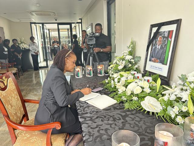 WINDHOEK, 27 February 2025 - Former First Lady of Zimbabwe, Grace Mugabe signing Sam Nujoma’s condolence book. (Photo by: Eba Kandovazu) NAMPA