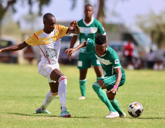 Mariental, 08 March 2025 - UNAM FC player (left) while in action against Young Africa during the semi-final of the MTC Maris Cup at the Mariental Stadium. (Photo by: Hesron Kapanga) NAMPA 