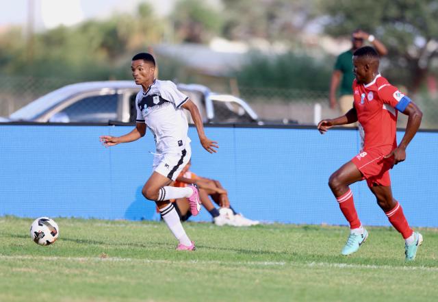 Mariental, 08 March 2025 - African Stars, Ronald Ketjijere  (in red) while in action against Giovanni Engelbrecht of Bucs Buccaneers during the semi-final of the MTC Maris Cup at the Mariental Stadium. (Photo by: Hesron Kapanga) NAMPA 