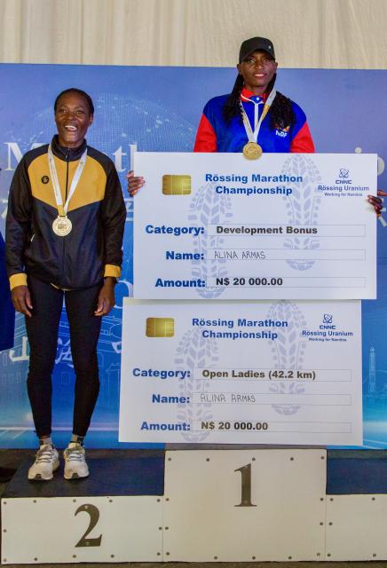 WINDHOEK, 08 March 2025 - Namibia Defence Force runners Alina Armas (right) and Beata Naigambo (left)  pose for a picture during the award ceremony the 34th Rössing National Marathon champions in Swakopmund the championship, featured over 3,000  runners. (Photo contributed) NAMPA