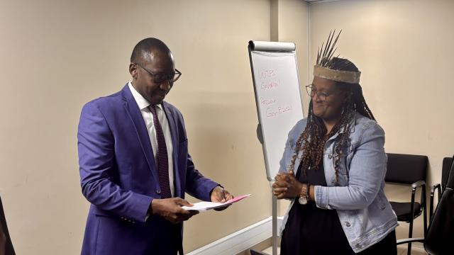 SWAKOPMUND, 10 MAR (NAMPA) - Erongo Governor Neville Andre Itope accepting a petition on behalf of Urban and Rural Development Minister Erastus Uutoni from Jessica Basson on behalf of the concerned residents of Henties Bay. The petition has read and handed over in Swakopmund on Monday. (Photo by: Isabel Bento) NAMPA