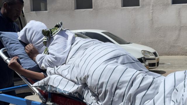 WALVIS BAY 11 March 2025 - Mastermind in the N.dollars 29 million fraud case, 34 year old Victoria George who is 5 months pregnant, being loaded into the ambulance after falling ill while awaiting bail hearing application at the Walvis Bay Magistrate Court on Tuesday. (Photo by: Isabel Bento) NAMPA