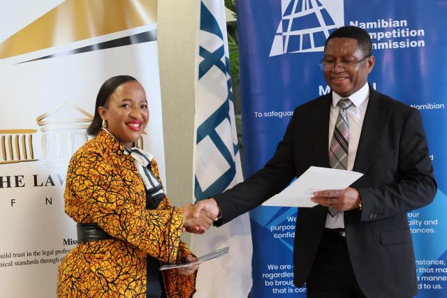 WINDHOEK, 18 March 2025- Director of the Law Society of Namibia, Neliswa Tjahikika and Namibian Competition Commission CEO Vitalis Ndalikokule. (Photo by: Eba Kandovazu) NAMPA