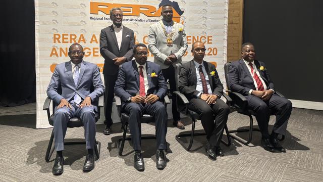 SWAKOPMUND, 09 April 2025 - Deputy Prime Minister and Minister of Industrialisation, Mines and Energy Natangwe Ithete (front second left), Erongo Governor Neville Andre Itope (front far left), Swakopmund Mayor Blasius Goraseb (standing right), Chairperson of RERA Skhumbuzo Tsabedze (sitting second right), photographed with Electricity Control Board CEO Robert Kahimise (far right sitting) and ECB Deputy Board Chairperson Tiama Tjivikua (standing left) at the opening of the Regional Energy Regulators Association of Southern Africa (RERA) annual conference in Swakopmund on Wednesday. (Photo by: Isabel Bento) NAMPA