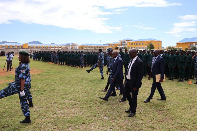 RIETFONTEIN, 30 April 2025 - Prime Minister, Dr Elijah Ngurare (front secod from right) at the official launch of the practical training sessions of the charcoal production course at the National Youth Service (NYS)'s Rietfontein centre outside Grootfontein in the Otjozondjupa Region on Wednesday. Behind him standing are  345 recruits of NYS who graduated with certificates part-one of the biomass business and charcoal production course at the centre on Wednesday. (Photo by: Mulisa Simiyasa) NAMPA