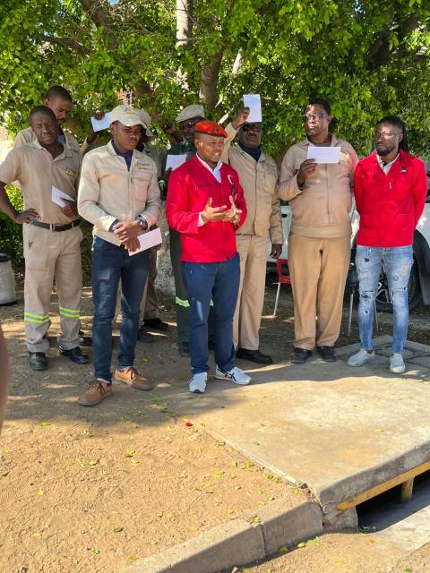 WINDHOEK, 07 May 2025 - The Namibian Revolutionary Transport and Manufacturing Union's (NARETU) leader Petersen Kambinda with Pretorious Plant Hire employees and another member of the union. ( Photo: Contributed)
