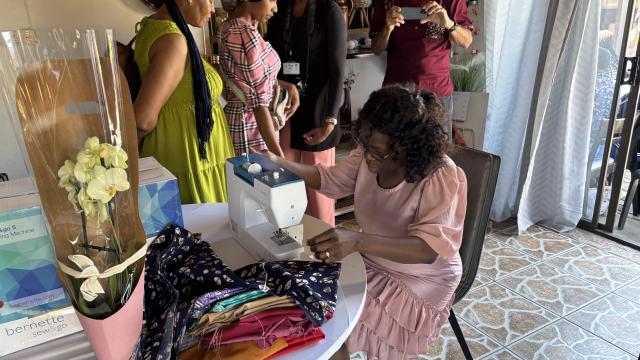 SWAKOPMUND, 10 May 2025 - A volunteer for the free tailoring classes demonstrating the use of one of the machine machines aimed at equipping community members of Mondesa with practical skills for self-employment. (Photo by:Isabel Bento) NAMPA