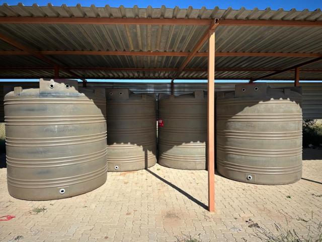 OUTJO, 13 May 2025- The Outjo Constituency office handed over four water tanks and pipes to local farming communities in the Outjo Constituency. (Photo: Contributed) NAMPA