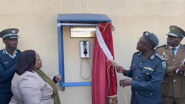 WALVIS BAY, 06 JUNE 2025 - Minister of Home Affairs, Immigration, Safety and Security Lucia Iipumbu and Commissioner General of the Namibia Correctional Service Raphael Hamunyela unveiling the telio inamte telephone service at the Walvis Bay Correctional Facility. (Photo by: Isabel Bento) NAMPA