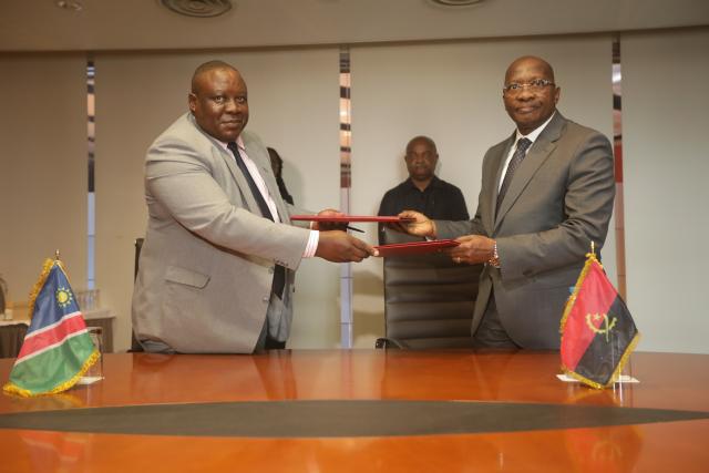 LUANDA, 13 June 2025 - Epifanius Jata Kuzee Kazondu, Acting Chief Executive Officer of NAMPA and Josué Salusuvã Isaías, President of the Board of Directors for ANGOP pictured after signing MoU. (Photo by Agência Angola Press (ANGOP)  