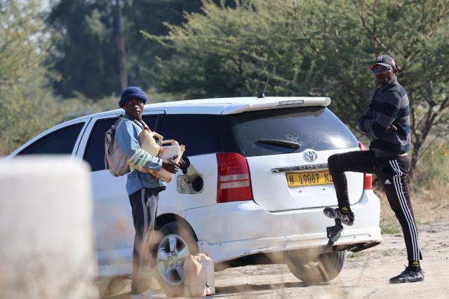 OSHIKANGO- Illegal fuel smuggler from Angola filling up car in Namibia. (Photo by: Linea Dishena) NAMPA 