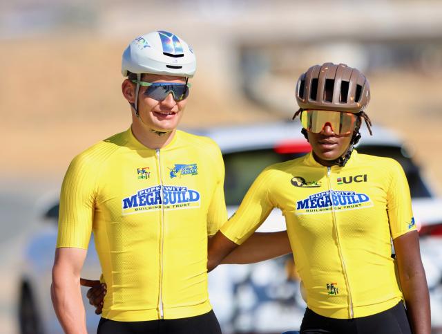 WINDHOEK, 03 August 2025 – Namibian rider Drikus Coetzee (left) and Rwandan cyclist Xaveline Nirere poses for a picture after winning the overall general classification categories of the male and female for the 2025 Tour de Windhoek. Namibia’s premier international cycling event, the Tour de Windhoek, was held from 31 July to 3 August 2025 around the Namibian capital. (Photo by: Hesron Kapanga) NAMPA
