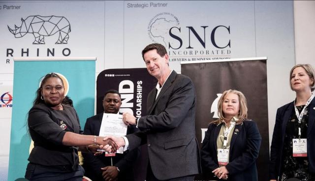 WINDHOEK, 13  AUG (NAMPA) - Chief Executive Officer of PETROFUND, Nillian Mulemi (Right)  and FNB Chief Executive Officer  Conrad Dempsey (Left) sealing the deal with a handshake during the MOU signing Ceremony at the 3rd Namibia Oil and Gas Conference. (Photo: Contributed) NAMPA