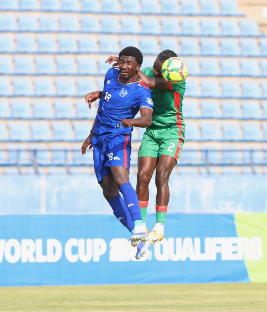 FRANCISTOWN, 05 September 2025 - Brave Warriors left back Aprocious Petrus (in blue) while in action against McDonald Lameck of Malawi during Namibia's 2-1 defeat to Malawi during their 2026 World Cup qualifiers at the Obed Itani Chilume Stadium in Francistown, Botswana. (Photo by: Hesron Kapanga) NAMPA