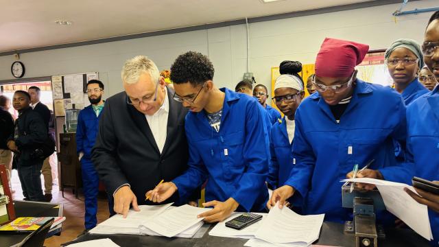ARANDIS, 19 September 2025 - European Union Commissioner for International Partnerships Jozef Sikela watching over some of the NIMT trainees’ theoretical work. (Photo by: Isabel Bento) NAMPA