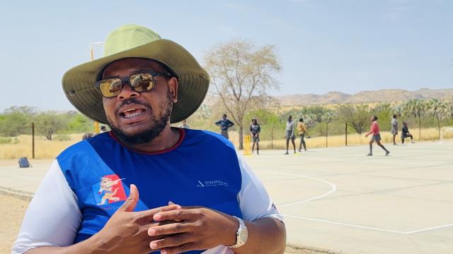 OTJIMBINGWE, 24 September 2025 - Cricket Namibia’s Jason Ambuga speaking to the media about the institution’s initiative at Otjimbingwe Primary School. (Photo by: Isabel Bento) NAMPA