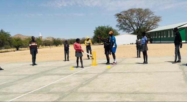 OTJIMBINGWE, 24 September 2025 - Learners at the Otjimbingwe Primary School learning to play cricket through an initiative by Cricket Namibia. (Photo by: Isabel Bento) NAMPA