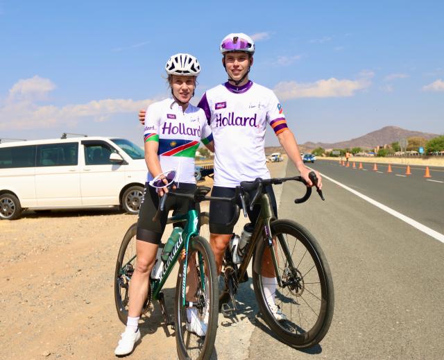 WINDHOEK, 05 October 2025  – Elite female cyclist Anri Greef (left) and Junior cyclist Roger Suren pose for a photo along the A1 highway after winning their diferent categories during the 26th edition of the Namibian Cycle Classic that saw over 500 riders, who competed across three categories: 25 kilometres (km), 60km, and 100km.  (Photo by: Hesron Kapanga) NAMPA

