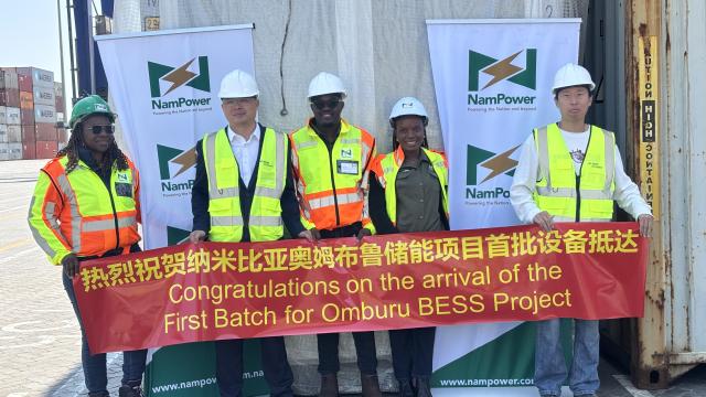 WALVIS BAY, 14 October 2025 - Nampower’s Engineer in the Generations Project Elias Iilende and Shandong Electrical Engineering  General manager of the African Market Benny Jim photographed with other Nampower and SDEE partners during the symbolic arrival of the first shipment for the Omburu battery energy storage at Walvis Bay. (Photo by: Isabel Bento) NAMPA