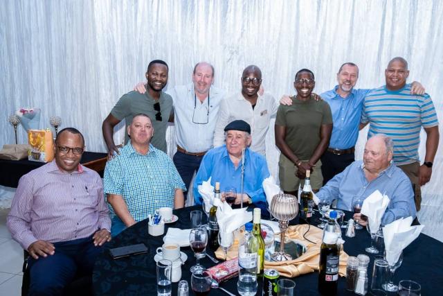 WALVIS BAY, 01 July 2024 - The late John Savva fondly known as “uncle Savva” photographed with some businessmen as well as some of the Golden Boys such as Chief Executive Officer of the Namibia Airports Company Bisey Uirab, former Fisheries and Marine Resources Minister Derek Klazen and Businessman Jose Bastos, after a meal and discussions around table 10 at the Atlantic Hotel. (Photo contributed) NAMPA