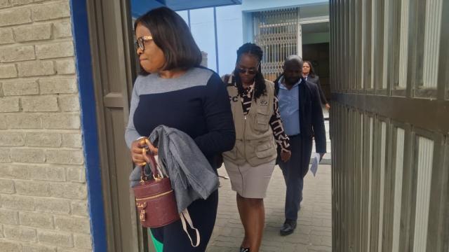 SWAKOPMUND, 05 November 2025 - Deputy Director  in the Ministry of Arts, Youth, Sports and Culture (MEYSAC) in the Erongo Region Natalia Guriras being escorted out of the regional council after she was arrested by the Anti-Corruption Commission for alleged fraud. (Photo contributed)