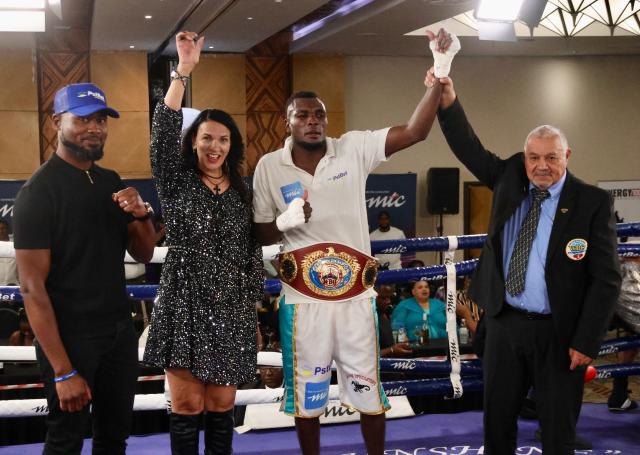 WINDHOEK, 08 November 2025 - Namibia’s super middleweight, Paulinus Ndjolonimus (in white), along side boxing officials and sponsors after defeating South Africa’s Snamiso Ntuli for the vacant World Boxing Organisation (WBO) Africa champions during the MTC Nestor Sunshine Tobias Boxing and Fitness Academy Boxing Bonanza, called “The Redemption Fight” at the Windhoek Country Club Resort. (Photo by: Hesron Kapanga) NAMPA