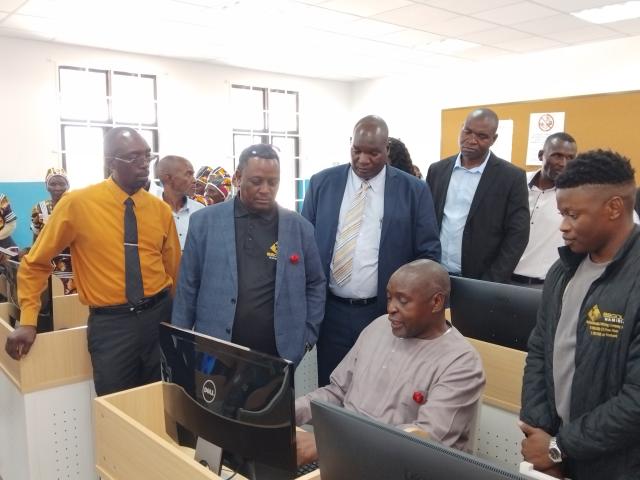 MASOKOTWANI, 10 NOV (NAMPA) – B2Gold Namibia on Monday officially pledged 40 computers valued at N. dollar 250 000 to the Masokotwani combined school in the Zambezi region.
Urban and Rural Development Minister, James Sankwasa who facilitated the donation seats on one of the computer desks to operate the computer.
(Photo: Michael Mutonga Liswaniso) NAMPA
