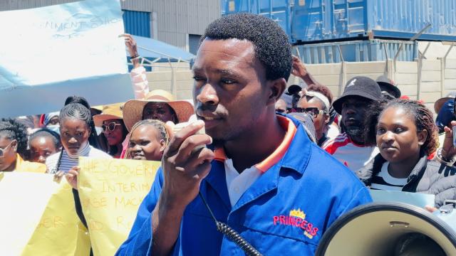 WALVIS BAY, 13 November 2025 - Shopsteward of the employees of Princess Brand Processing Silas Petrus reading the petition handed over to the ministry of agriculture, fisheries, water and land reform in Walvis Bay on Thursday. (Photo by: Isabel Bento) NAMPA