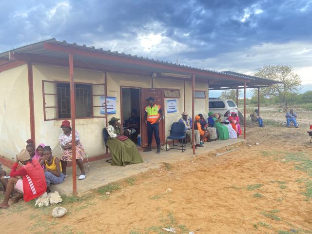 GAM, 26 November 2025 - Voters pictures outside Gam Voters Education Offices polling station. (Photo: Edward Tenete) Nampa