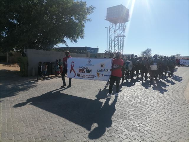 OTJIWARONGO, 01 December 2025 - Street procession to raise public awareness at the 2025 commemoration of World Aids Day on Monday morning at Otjiwarongo in the Otjozondjupa. (Photo by: Mulisa Simiyasa) NAMPA 