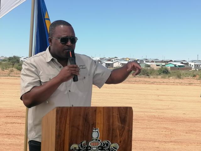 OTJIWARONGO, 02 December 2025 - Ground-breaking for the construction of a new tarred road to Ombili informal settlement and other development projects at Otjiwarongo by government through the Ministry of Urban and Rural Development. Otjiwarongo Municipality Chief Executive Officer, Mberipura Hifitikeko speaks at the event on Tuesday. (Photo by: Mulisa Simiyasa) NAMPA 