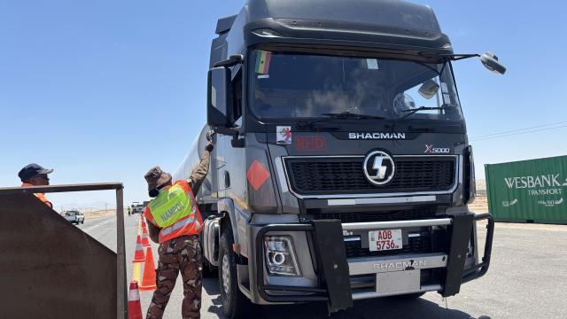 SWAKOPMUND 09 December 2025 - Law enforcement officers intercepting a truck at the Swakopmund roadblock as the regional road safety campaign kicks off. (Photo by: Isabel Bento) NAMPA