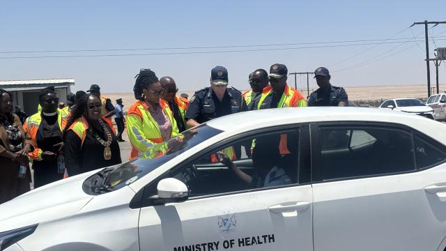 SWAKOPMUND, 09 December 2025 - Erongo Governor Natalia |Goagoses, Erongo Police Commander Commissioner Nikolaus Kupembona and Swakopmund Mayor Suama Kautondokwa and other regional leaders intercepting vehicles at the Swakopmund roadblock as the regional road safety campaign kicks off. (Photo by: Isabel Bento) NAMPA