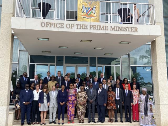 WINDHOEK, 11 December 2025 - The Minister of International Relations and Trade, Selma Ashipala-Musavyi, pictured together with members of the diplomatic corps outside the Office of the Prime Minister. (Photo: Edward Tenete)