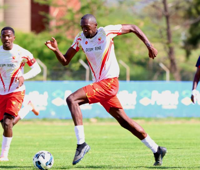 WINDHOEK, 13 December 2025 - The University of Namibia (UNAM) Football Club players Nestor Iyambo (Centre) while in action against African Stars during Round 12 of the Namibia Premier Football League at the UNAM Stadium. The game ended 1-1 extending UNAM's unbeaten run to 12 matches during the 2025/26 Premier League  Season. (Photo by: Hesron Kapanga) NAMPA