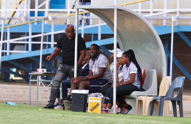 WINDHOEK, 13 December 2025 - UNAM Football Club head coach Robert Nauseb (left) and assistant coach Willem Mwedihanga during Round 12 of the Namibia Premier Football League match against African Stars at the UNAM Stadium. The game ended 1-1 extending UNAM's unbeaten run to 12 matches during the 2025/26 Premier League  Season. (Photo by: Hesron Kapanga) NAMPA