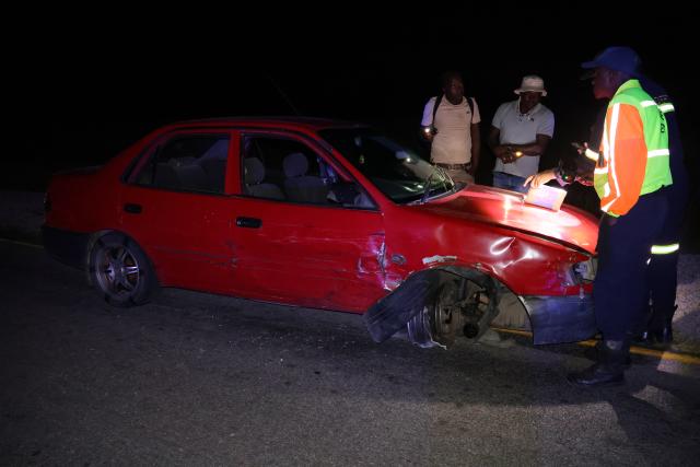 OTJIWARONGO, 05 January 2026 - The red Corolla which collided with a minibus outside Otjiwarongo on Monday night and a woman lost her life in the minibus as a result after it overturned upon the 35-year-old driver lost control over it on Otjiwarongo-Okahandja B1 road. (Photo by: Mulisa Simiyasa) NAMPA