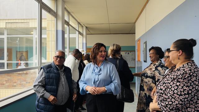 SWAKOPMUND, 12 January 2026 - Minister of Education, Innovation, Youth, Sport, Arts and Culture Sanet Steenkamp photographed with some school board members at the Westside High School during her visit to the school as part of her ministry’s assessment on how schools in Erongo Region were opening and to present the 2025 national examination results to President Netumbo Nandi-Ndaitwah. (Photo by: Isabel Bento) NAMPA