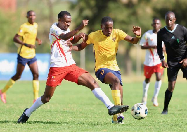 WINDHOEK, 31 January 2026 - Otjiwarongo-based Namibia Premier Football League (NPFL) outfit Mighty Gunners’ attacking midfielder Sedni Tsuseb (in gold) keeps his eye on the ball against UNAM FC during round 14 of the 2025/26 season at the UNAM Stadium. Mighty Gunners handed UNAM their first defeat after going unbeaten in 13 league matches. (Photo by: Hesron Kapanga) NAMPA