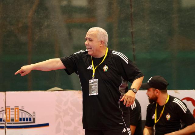 SWAKOPMUND, 04 February 2026 - The head coach of Libya's senior national futsal team, Abdulbasit Alnaas, relays instructions to his players during their match against Namibia in the 2026 Morocco CAF Futsal AFCON qualifiers at The Dome in Swakopmund. Namibia lost the match 3-11. (Photo by: Hesron Kapanga) NAMPA 
