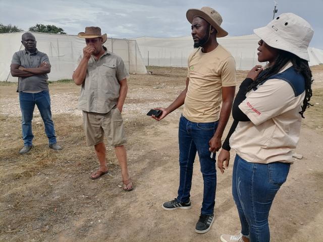 SESFONTEIN, 12 February 2026 - Farm Manager of Warmquelle Green Scheme at Sesfontein in the Kunene Region, Johannes Swanepoel (second left) speaks about the food production at the farm on Thursday. (Photo by: Mulisa Simiyasa) NAMPA 