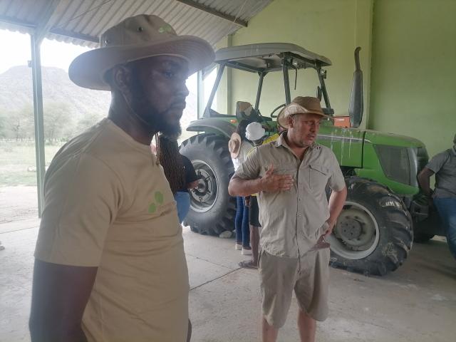SESFONTEIN, 12 February 2026 - Farm Manager of  Warmquelle and Khowarib Green Scheme, Johannes Swanepoel (R) and Romeo Muyunda of the Environmental lnvestment Fund at Sesfontein in the Kunene Region on Thursday afternoon. (Photo by: Mulisa Simiyasa) NAMPA 