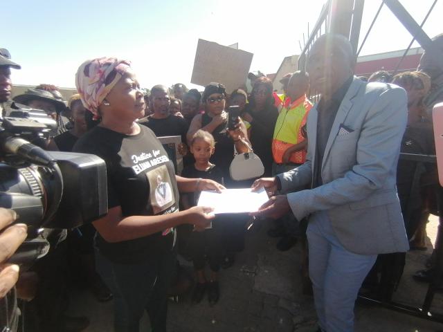 OTJIWARONGO, 16 February 2026 - Otjozondjupa Regional Health Director, Gebhardo Timoteus (R) on Monday morning receives a petition of the Otjiwarongo community agrieved of a deteriorating healthcare service delivery at the Otjiwarongo State Hospital. (Photo by: Mulisa Simiyasa) NAMPA 