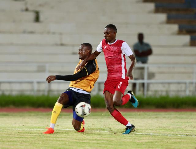 WINDHOEK, 20 February 2026 - African Stars defender Tjimbinondjo Tjitemisa (right) while in action against Bernand Horaseb (left) of Mighty Gunners during round 19 of the Namibia Premier Football League (NPFL) at the Independence Stadium. African Stars secured a 1-0 victory over Mighty Gunners in a high-stakes clash between defending champions African Stars and Mighty Gunners, who entered the encounter separated by a single point in second and third place, respectively. (Photo by: Hesron Kapanga) NAMPA