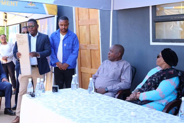 WINDHOEK, 06 March 2026 – President Netumbo Nandi-Ndaitwah and Urban and Rural Development Minister James Sankwasa listening to ABT Director Medusalem Shilongo explaining the benefits of alternative building material (Photo: Andreas Thomas) NAMPA 