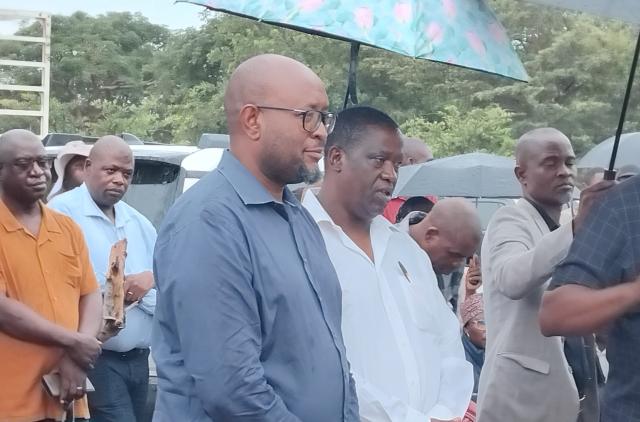 SIBBINDA, 31 April 2026 - Deputy Executive Director in the Ministry of Environment, Forestry and Tourism, Colgar Sikopo (left) responding to some of the flash floods victims' concerns on human-wildlife conflict at the Sibbinda relocation camp. Pictured with him is Constituency Councillor Matengu Nkando.
(Photo by: Michael Mutonga Liswaniso) NAMPA 
