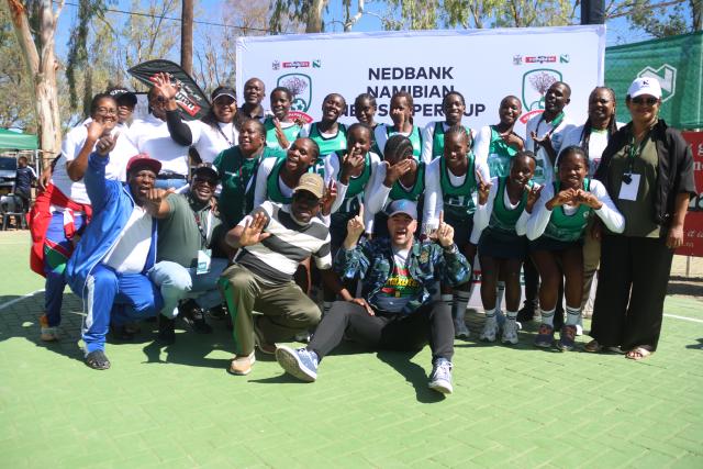 KEETMANSHOOP, 06 April 2026 - Kavango East Under-20 netball team poses for a picturewith the deputy minster of sport Dino Balloti after being crowned champions of the 2026 Nedbank Namibian Newspaper Cup at the Westdene Stadium in Keetmanshop. Kavango East won the match 35-28. (Photo by: Hesron Kapanga) NAMPA